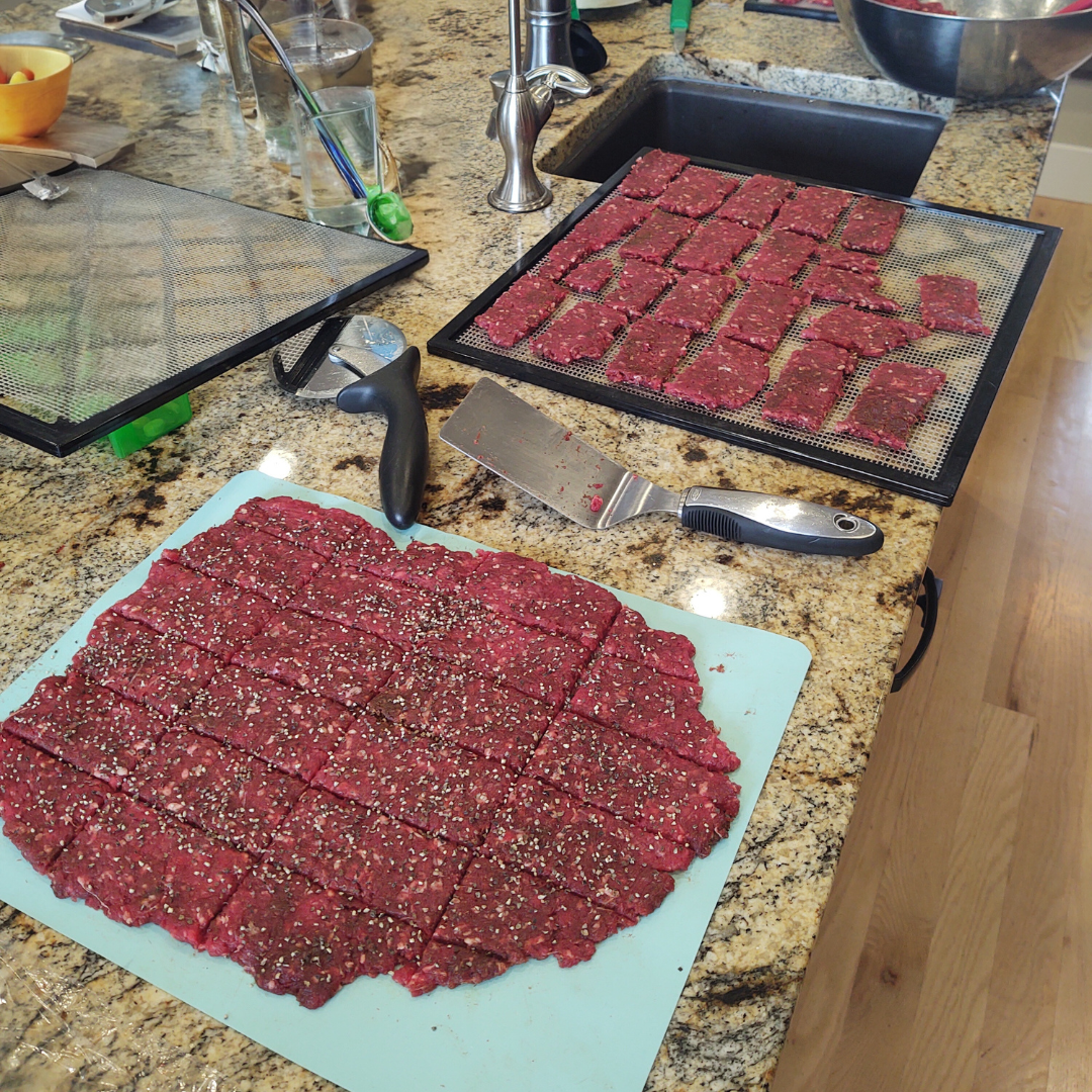 Homemade Jerky from ground venison being cut