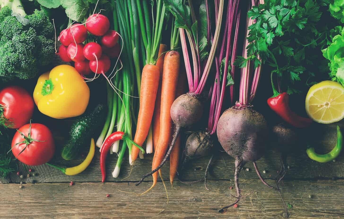 Vegetables on wooden background. Bio healthy organic food, herbs and spices. Raw and vegetarian concept. Ingredients. Banner with toned effect Your body's natural detoxification systems thrive when supported by colorful, whole foods—especially cruciferous vegetables, leafy greens, and fresh herbs